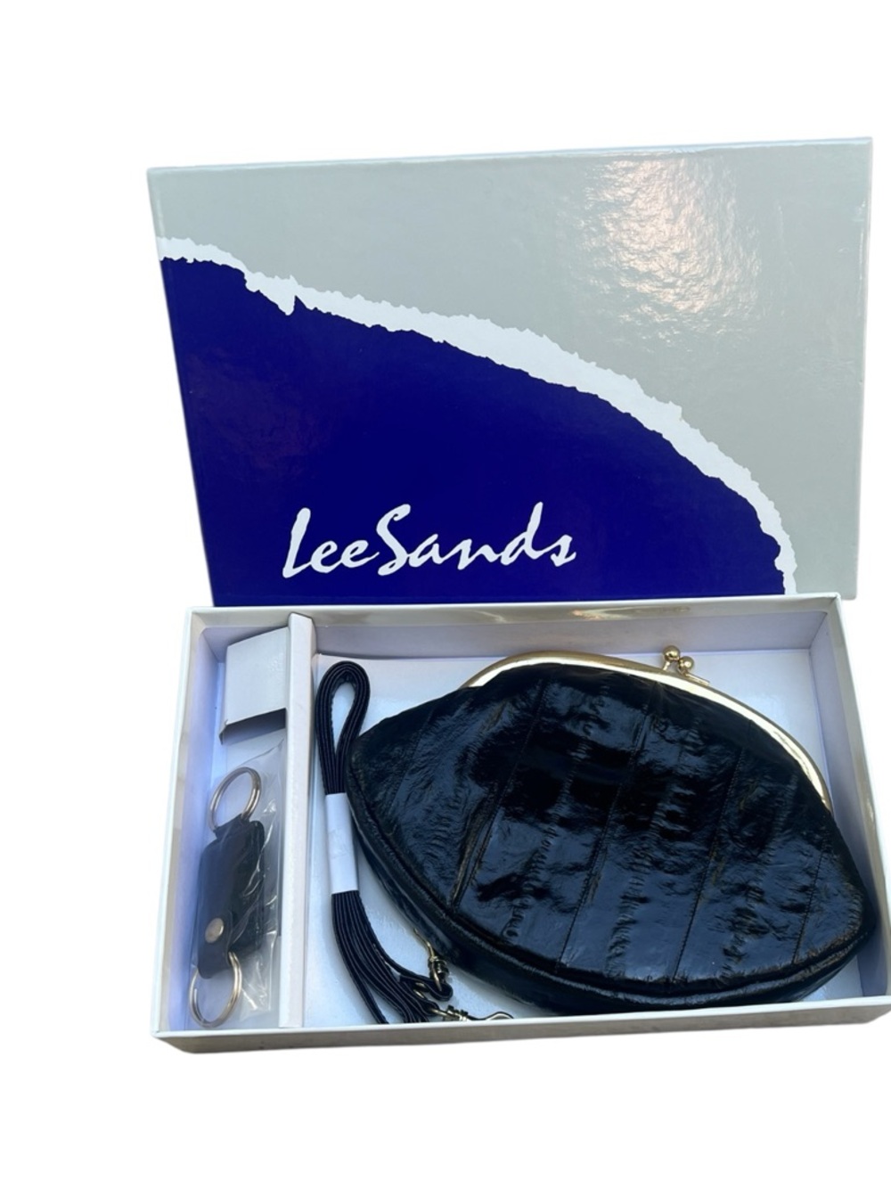 Vintage Lee Sands luxurious black eel skin clutch bag set.